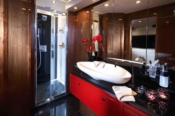 Slide: The Image of Luxurious 2010 Sunseeker Predator 84 yacht cruising on clear blue waters. - 12