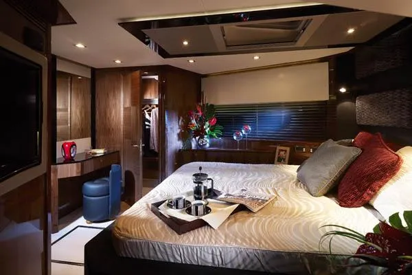 Slide: The Image of Luxurious 2010 Sunseeker Predator 84 yacht cruising in clear blue waters. - 13