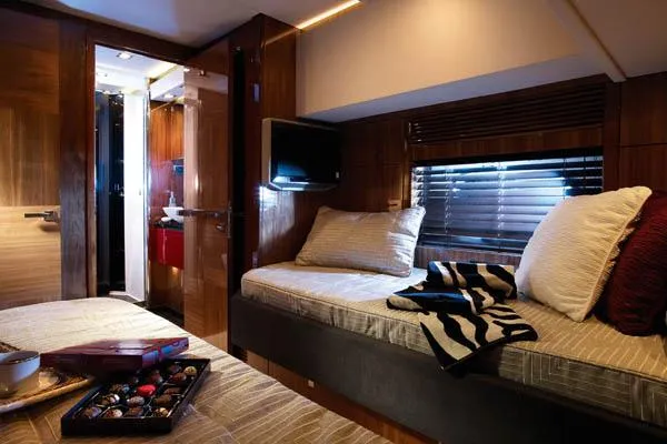 Slide: The Image of Luxurious 2010 Sunseeker Predator 84 yacht cruising on clear blue waters. - 14