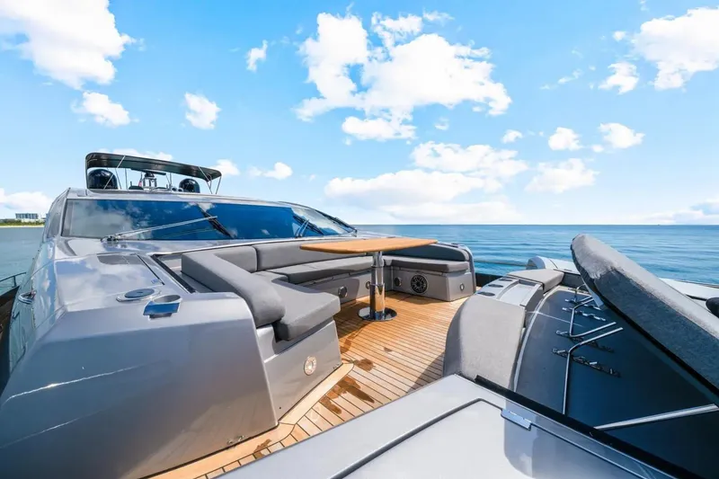 Slide: The Image of Luxurious 2010 Sunseeker Predator 84 yacht deck with ocean view and seating area. - 25