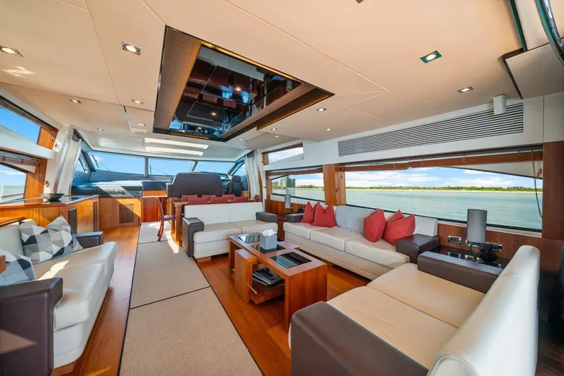 Slide: The Image of Luxurious interior of 2010 Sunseeker Predator 84 yacht with elegant seating and panoramic windows. - 32