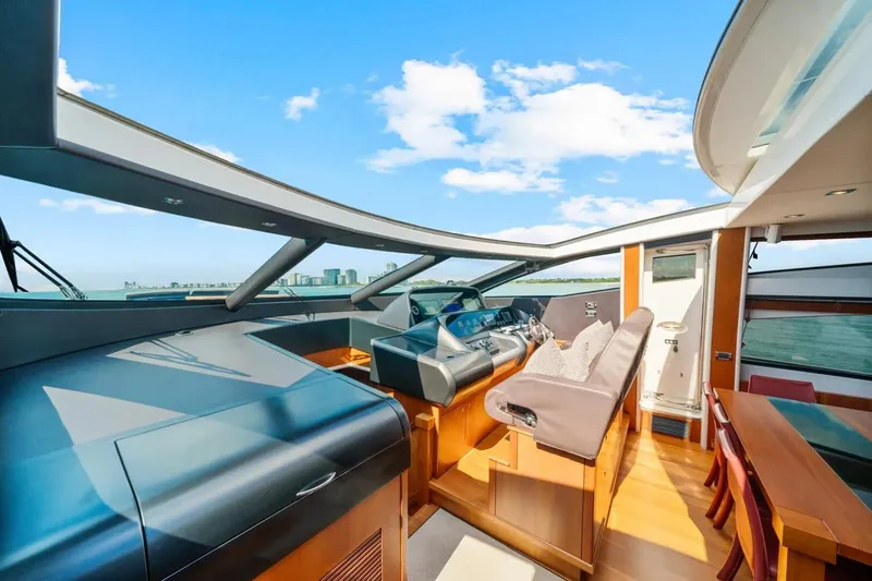 Slide: The Image of Luxurious interior of 2010 Sunseeker Predator 84 yacht with modern helm and seating. - 36