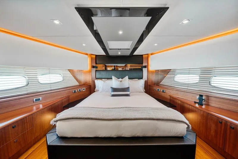 Slide: The Image of Luxurious bedroom interior of 2010 Sunseeker Predator 84 yacht with elegant wood finishes. - 42