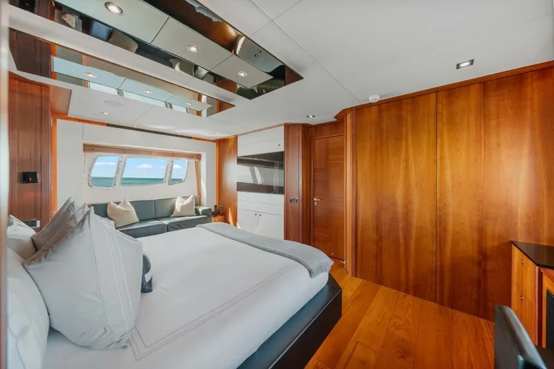 Slide: The Image of Luxurious interior of 2010 Sunseeker Predator 84 yacht with elegant wood finishes and ocean view. - 43
