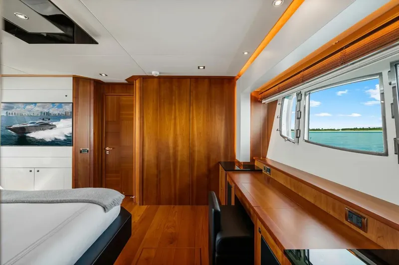 Slide: The Image of Luxurious interior of 2010 Sunseeker Predator 84 yacht with wood paneling and ocean view. - 45