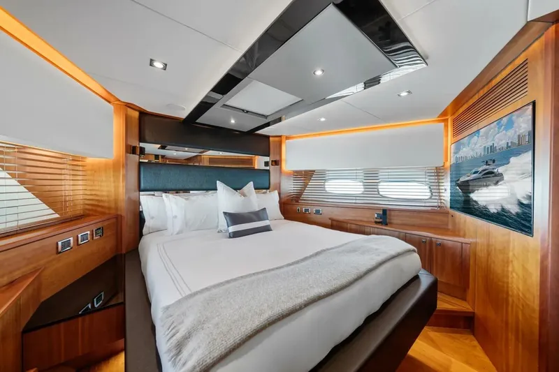 Slide: The Image of Luxurious bedroom interior of 2010 Sunseeker Predator 84 yacht with modern design elements. - 52