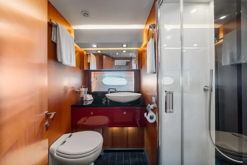 Slide: The Image of Luxurious bathroom on 2010 Sunseeker Predator 84 yacht with modern fixtures and elegant design. - 54