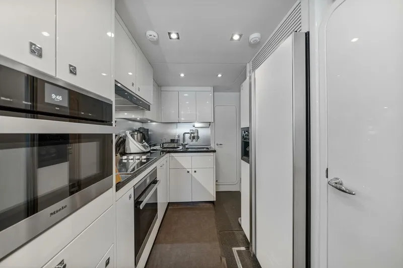 Slide: The Image of Luxurious kitchen interior of 2010 Sunseeker Predator 84 yacht with modern appliances. - 60