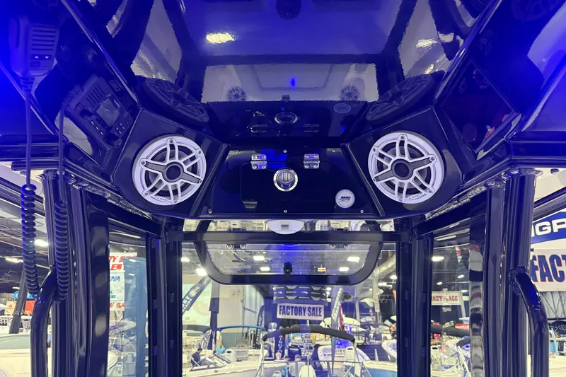 Slide: The Image of Interior view of 2026 Sportsman Masters 267OE Bay Boat with speakers and controls. - 5