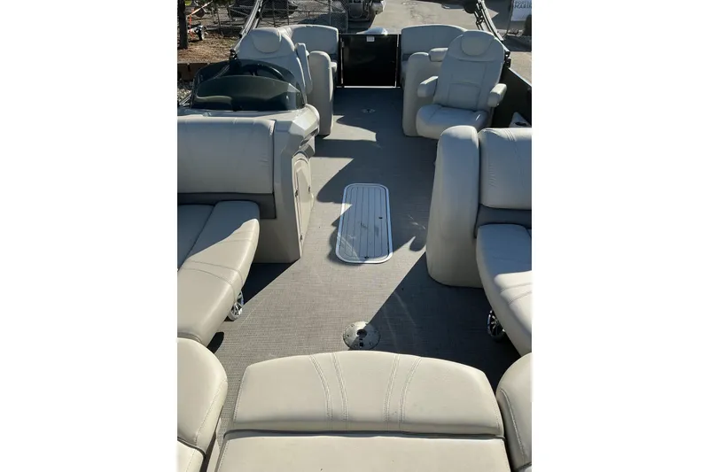 Slide: The Image of 2016 Starcraft SLS 3 boat interior with beige seating and spacious layout. - 9