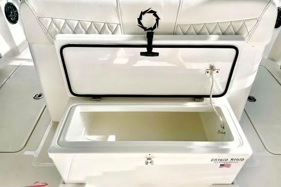 Slide: The Image of Open storage compartment on 2023 Fountain 38 Tournament Edition boat. - 12