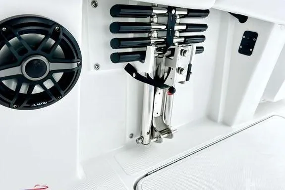 Slide: The Image of 2023 Fountain 38 Tournament Edition boat interior with speaker and rod holders. - 16