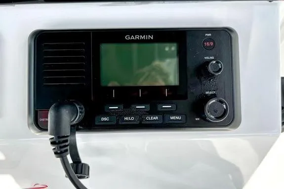 Slide: The Image of Garmin marine radio on 2023 Fountain 38 Tournament Edition boat dashboard. - 29