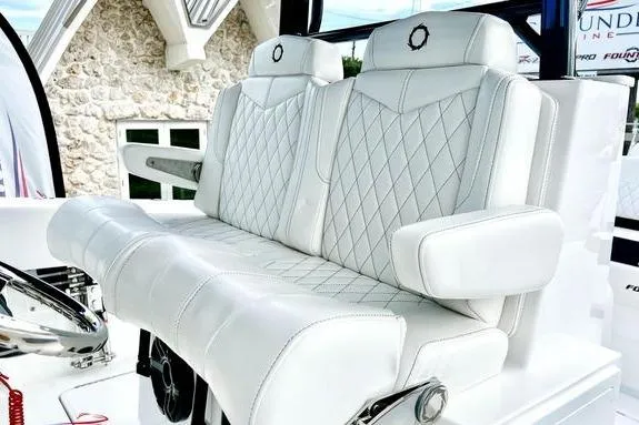 Slide: The Image of Luxurious seating on 2023 Fountain 38 Tournament Edition boat with diamond-stitched upholstery. - 30