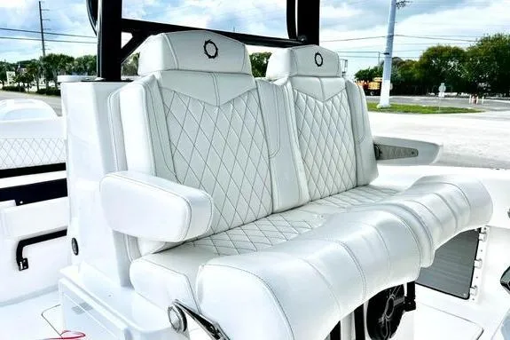 Slide: The Image of Luxurious seating on 2023 Fountain 38 Tournament Edition boat with diamond-stitched upholstery. - 31