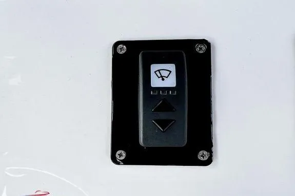 Slide: The Image of 2023 Fountain 38 Tournament Edition wiper control panel with up and down arrows. - 35