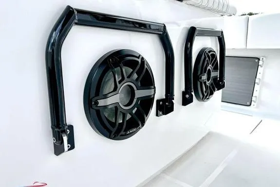 Slide: The Image of 2023 Fountain 38 Tournament Edition boat speakers and railings on deck. - 41