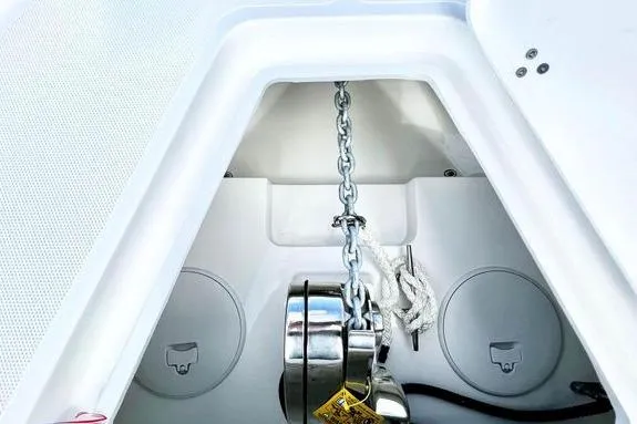 Slide: The Image of Anchor compartment of 2023 Fountain 38 Tournament Edition boat, featuring chain and rope storage. - 45