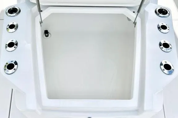 Slide: The Image of 2023 Fountain 38 Tournament Edition boat storage compartment with rod holders. - 51