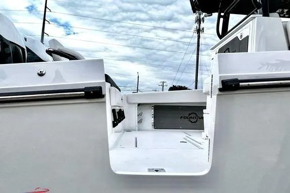 Slide: The Image of 2023 Fountain 38 Tournament Edition boat, rear view, showcasing sleek design and spacious deck. - 6