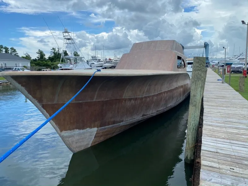 Slide: The Image of Guthrie Custom Sportfish 2020 at dock, unfinished. - 2