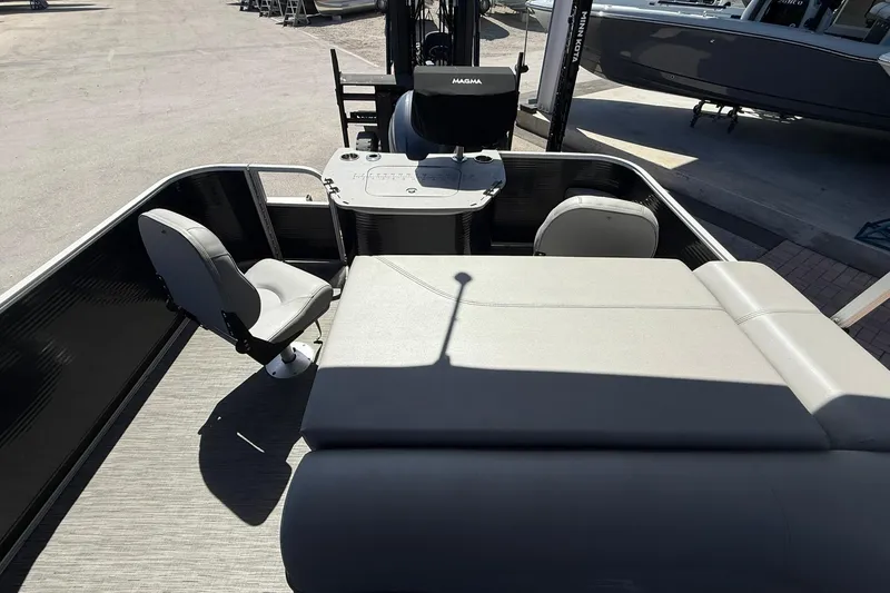 Slide: The Image of 2022 Bennington 22 SS Fish and Cruise boat interior with seating and control panel. - 16