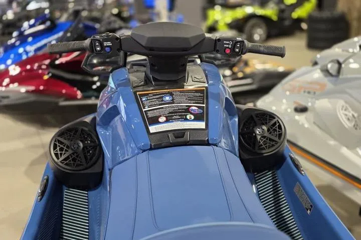Slide: The Image of 2026 Yamaha WaveRunner VX Cruiser, blue, detailed dashboard view in showroom setting. - 13