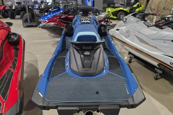 Slide: The Image of 2026 Yamaha WaveRunner VX Cruiser in showroom, blue and gray design, rear view. - 5