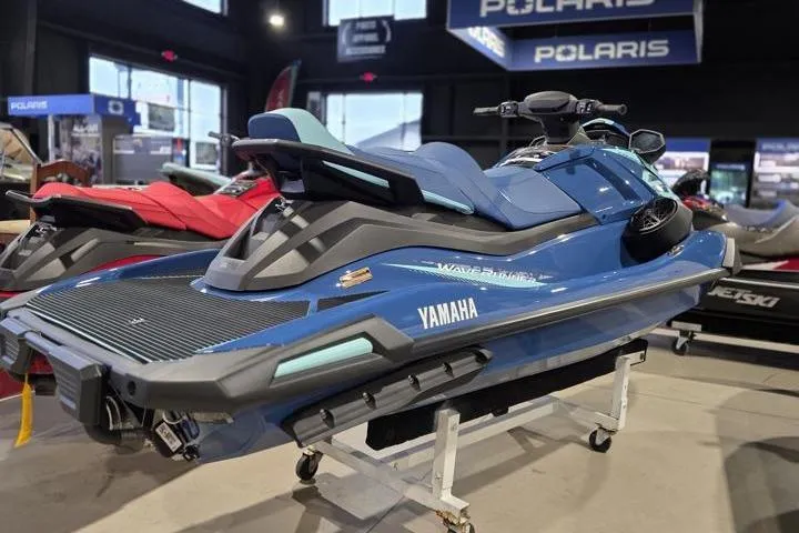 Slide: The Image of 2026 Yamaha WaveRunner VX Cruiser in showroom, blue color, displayed on stand. - 6