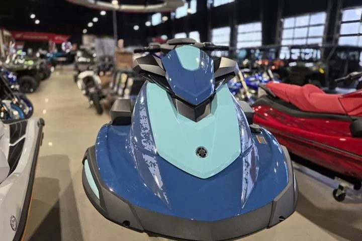 Slide: The Image of 2026 Yamaha WaveRunner VX Cruiser in showroom, blue and light blue design. - 9