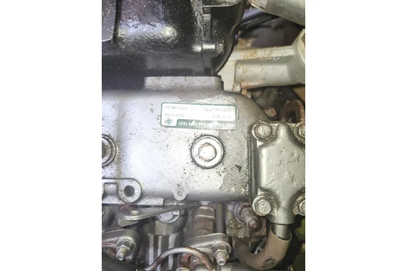 Slide: The Image of Close-up of a 1994 Island Packet 32 engine component with visible serial number. - 24