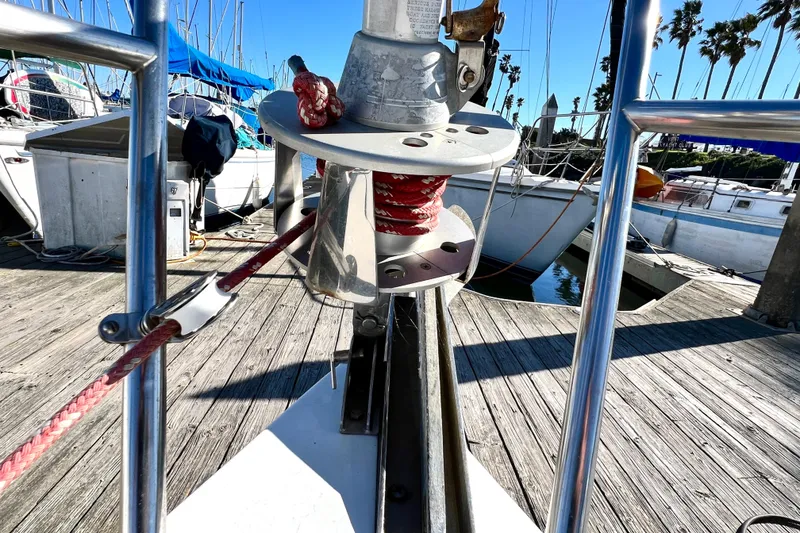 Slide: The Image of Bow of 1999 Catalina 36 MkII sailboat with docked marina view. - 18