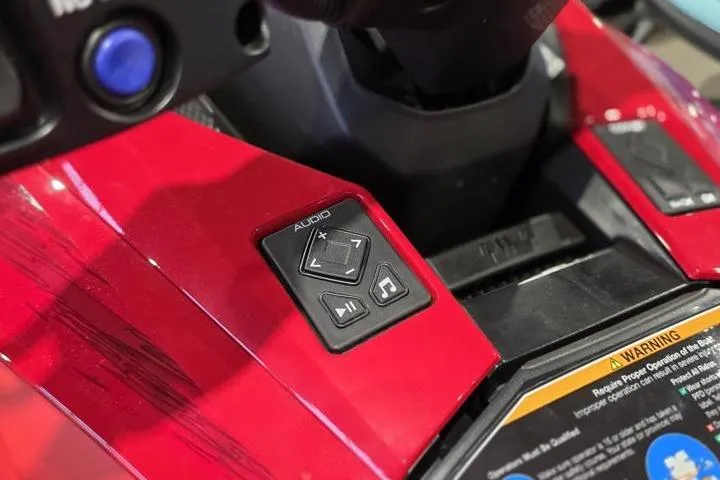 Slide: The Image of 2026 Yamaha WaveRunner GP SVHO audio controls on red dashboard. - 15