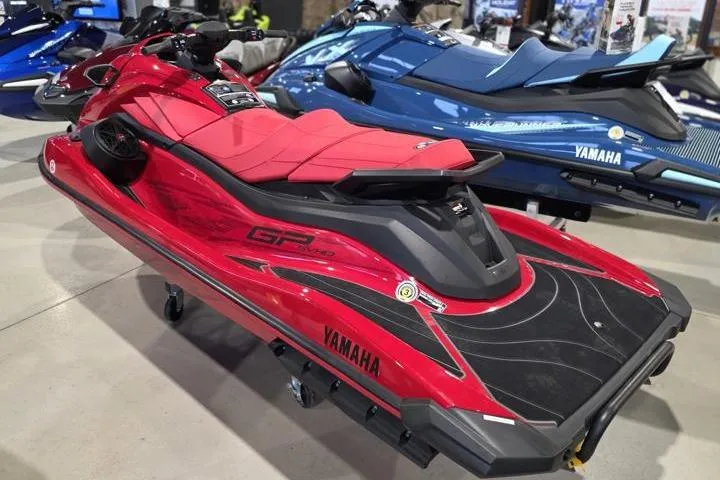 Slide: The Image of 2026 Yamaha WaveRunner GP SVHO in vibrant red, displayed in a showroom. - 4
