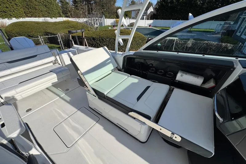 Slide: The Image of 2021 Blackfin 252 DC boat interior with adjustable seating and sleek design. - 14