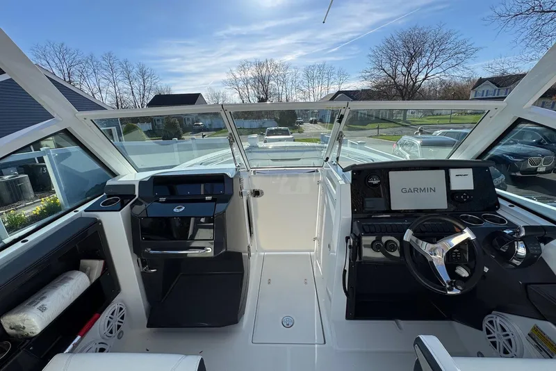 Slide: The Image of Interior view of a 2021 Blackfin 252 DC boat with Garmin navigation system. - 26