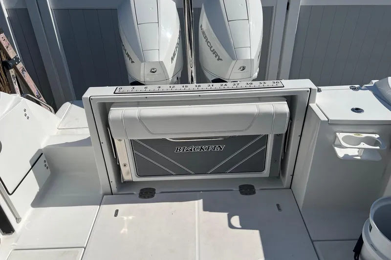 Slide: The Image of 2021 Blackfin 252 DC boat with dual Mercury engines and integrated fishing ruler. - 7