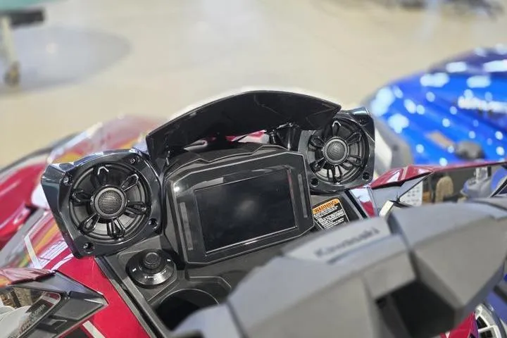 Slide: The Image of 2026 Kawasaki Jetski Ultra 310LX dashboard with speakers and display screen. - 12