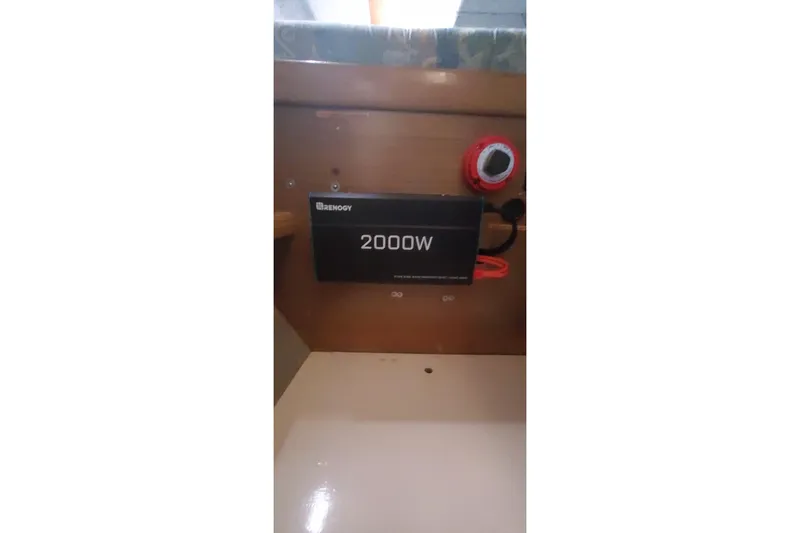 Slide: The Image of Renogy 2000W inverter installed on 1992 Fountaine Pajot Ninou yacht interior. - 26