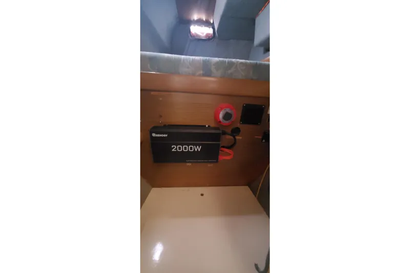 Slide: The Image of Interior of 1992 Fountaine Pajot Ninou with 2000W Renogy inverter installed. - 29