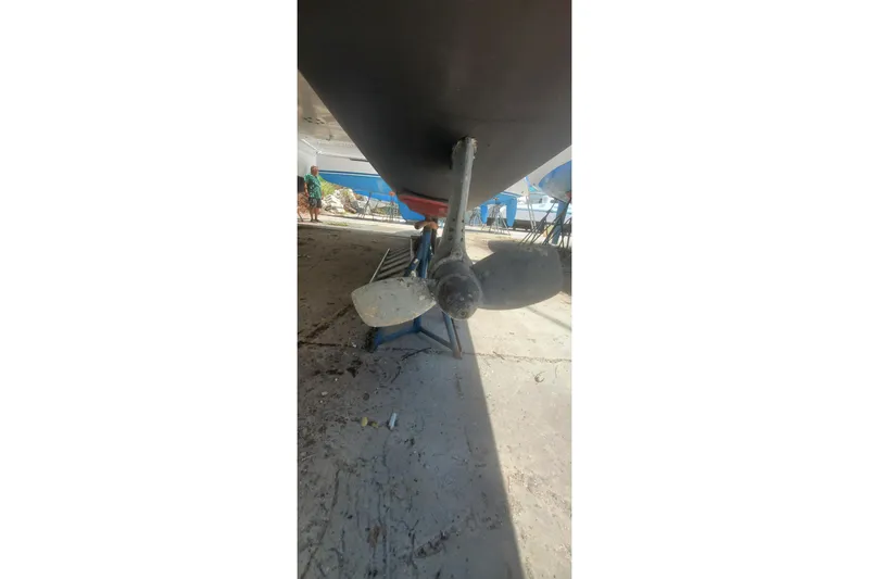 Slide: The Image of Propeller of 1992 Fountaine Pajot Ninou catamaran on dry dock. - 4