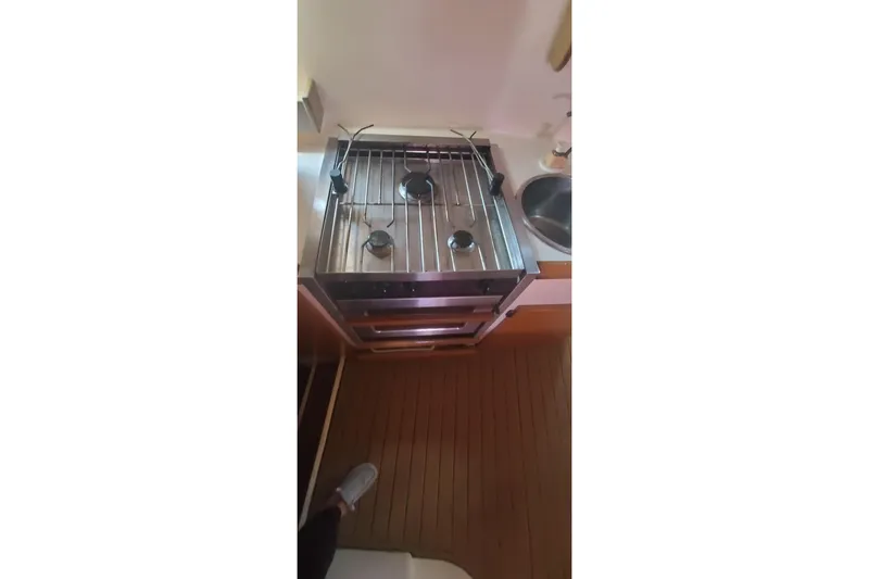 Slide: The Image of Galley kitchen in 1992 Fountaine Pajot Ninou with stove and sink. - 47