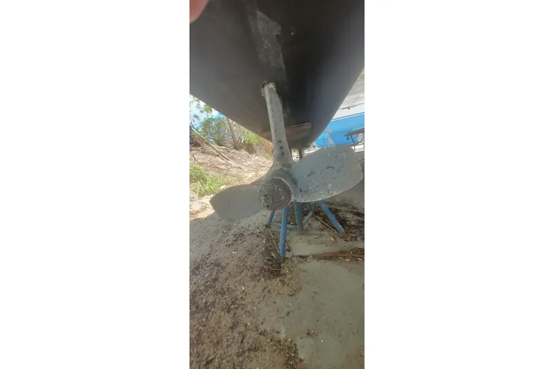 Slide: The Image of Propeller of 1992 Fountaine Pajot Ninou catamaran on dry dock. - 5