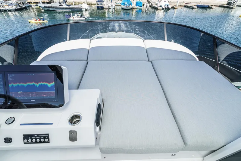 Slide: The Image of 2024 Azimut Fly 53 yacht with spacious sunbathing area and navigation display. - 15