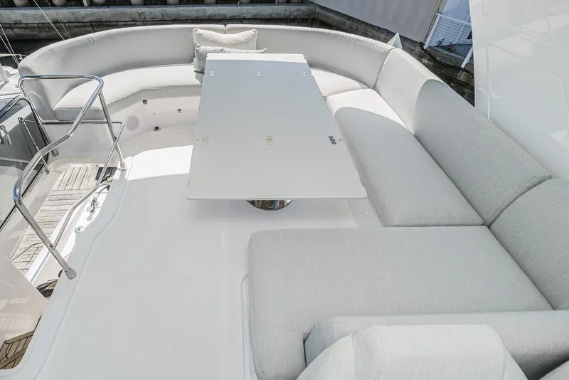 Slide: The Image of Luxurious seating area on 2024 Azimut Fly 53 yacht with sleek white design. - 17