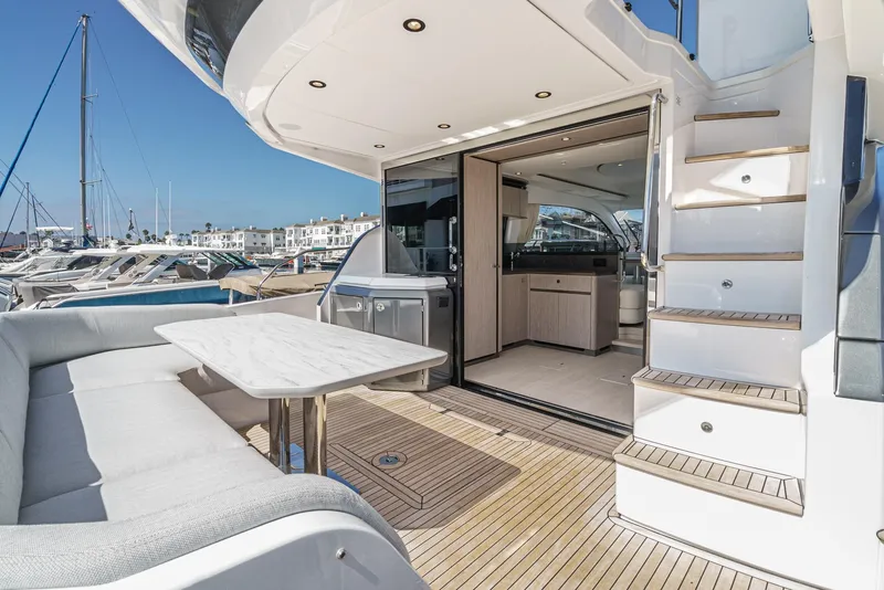 Slide: The Image of Luxurious 2024 Azimut Fly 53 yacht interior with elegant seating and modern design. - 21