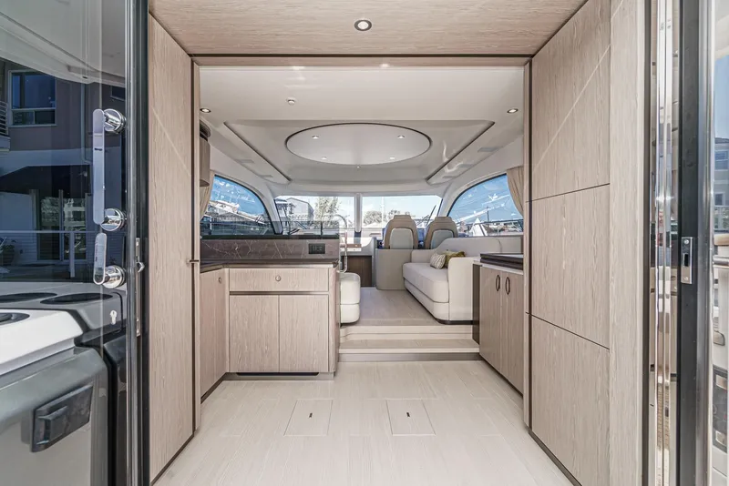 Slide: The Image of Luxurious interior of 2024 Azimut Fly 53 yacht with modern design and spacious seating. - 25