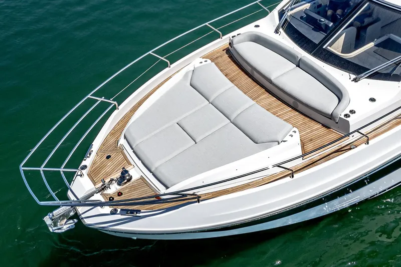 Slide: The Image of 2024 Azimut Fly 53 yacht with spacious sunbathing deck on calm water. - 6