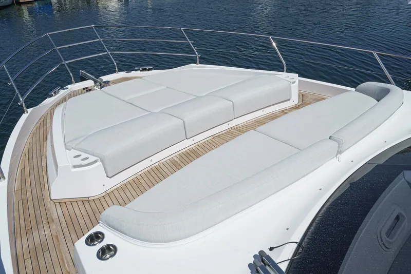 Slide: The Image of 2024 Azimut Fly 53 yacht with spacious sunbathing deck and elegant teak flooring. - 7