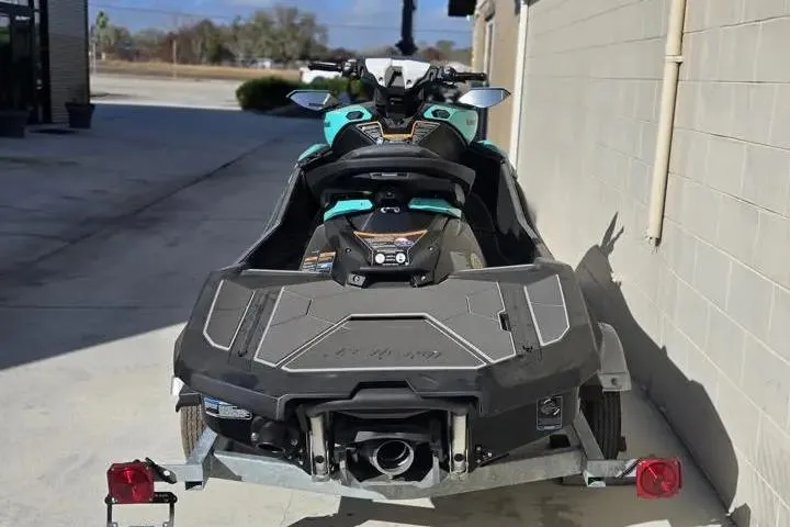 Slide: The Image of 2026 Kawasaki Jetski Ultra 310LX-S on trailer, parked outdoors. - 4